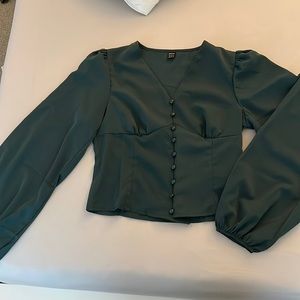 Deep green corset top with flared sleeves. Satin material.  SHEIN size M